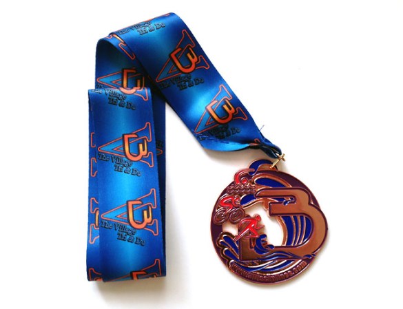Very cool medal from The Village Triathlon!