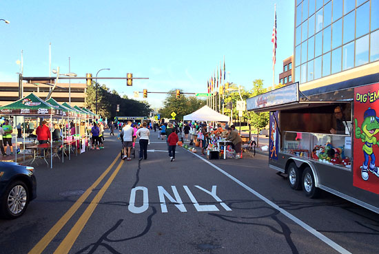 Various tents and the trailer with Kellogg's shirts and other goodies to purchase.